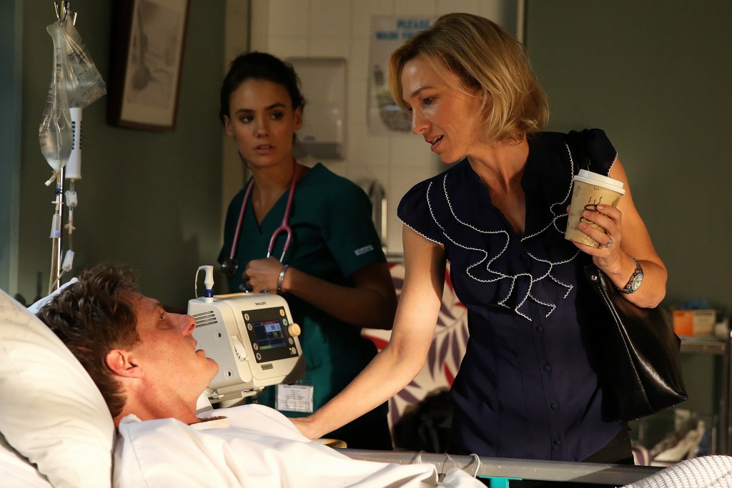 Roo is shocked to discover James's wife at his bedside